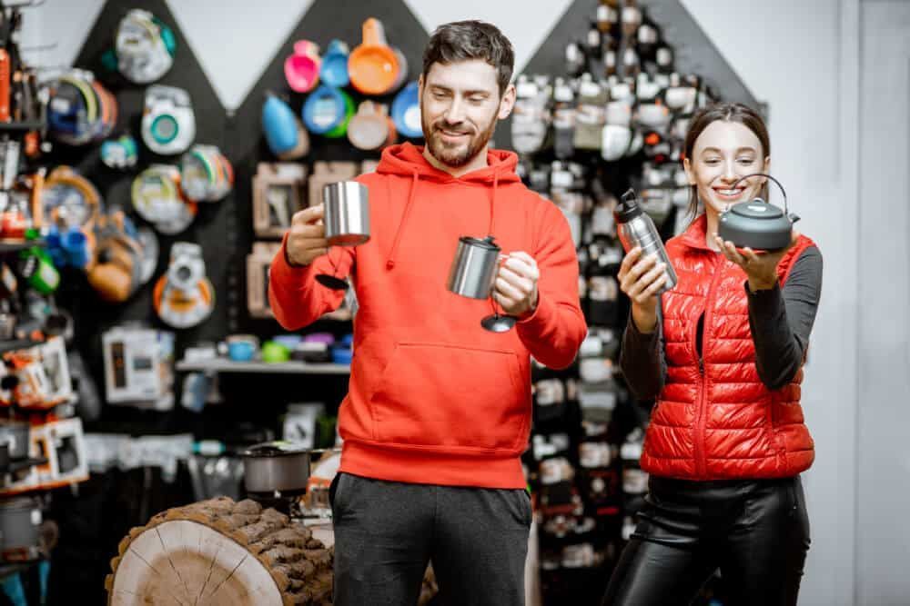 Couple choosing products while shopping in a store