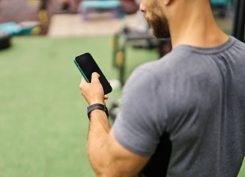 Young couple exercising together in a gym
