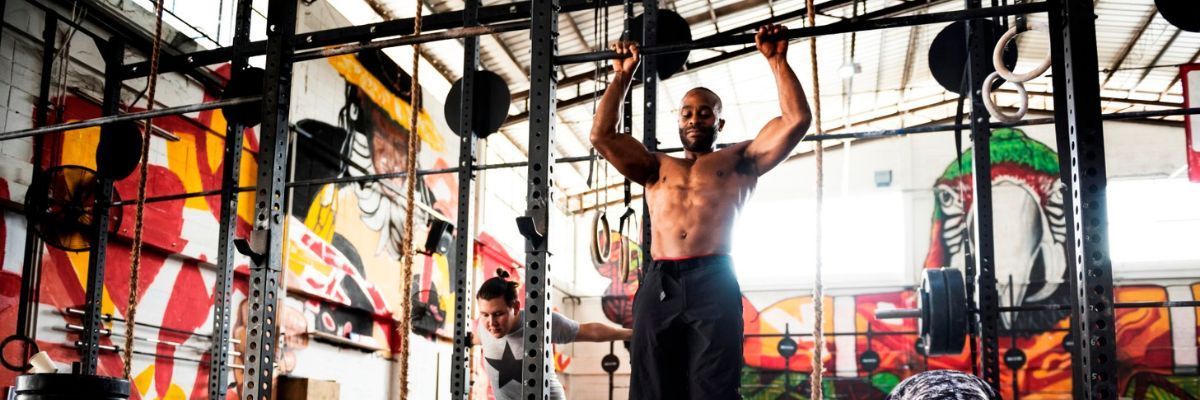 Athlete working out during the CrossFit Open at a box